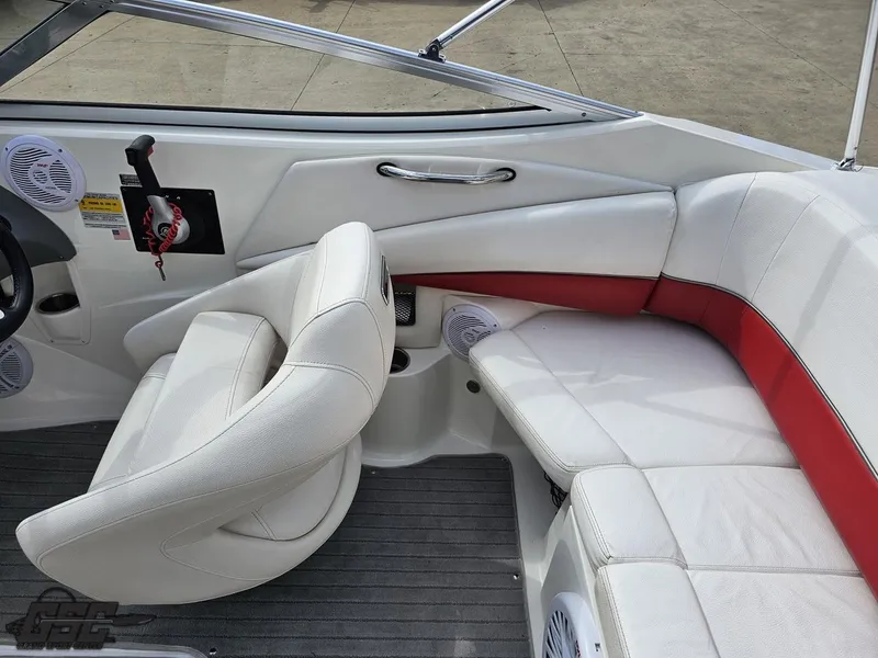 Slide: The Image of Interior of 2010 Larson Senza 186 boat with white and red seating. - 44