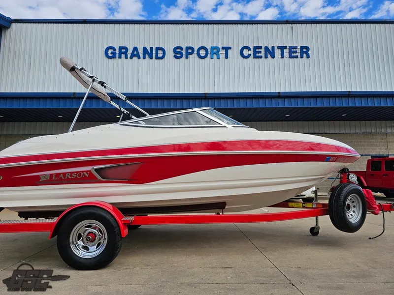 Slide: The Image of 2010 Larson Senza 186 boat on trailer at Grand Sport Center. - 5