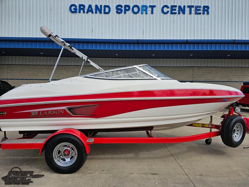 Slide: The Image of 2010 Larson Senza 186 boat on trailer at Grand Sport Center. - 6