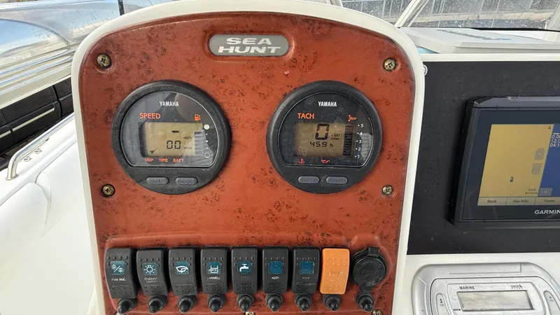 Slide: The Image of Control panel of a 2010 Sea Hunt Ultra 210 boat with Yamaha gauges. - 20