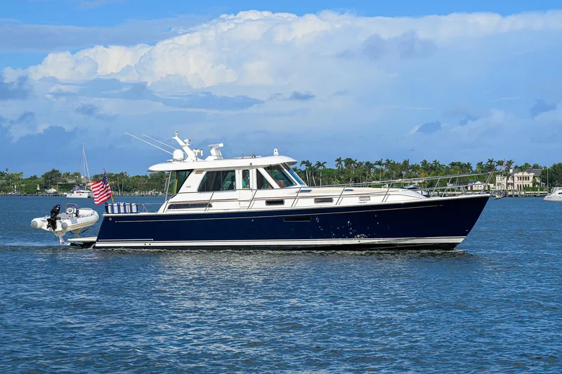 Slide: The Image of 2018 Sabre 48 Salon Express yacht cruising on a sunny day. - 3