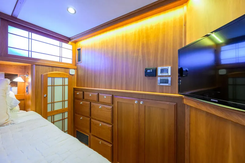 Slide: The Image of Luxurious interior of 2018 Sabre 48 Salon Express yacht with wood paneling and modern amenities. - 45