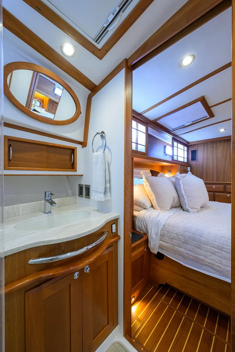 Slide: The Image of Luxurious interior of 2018 Sabre 48 Salon Express yacht with elegant wood finishes. - 49