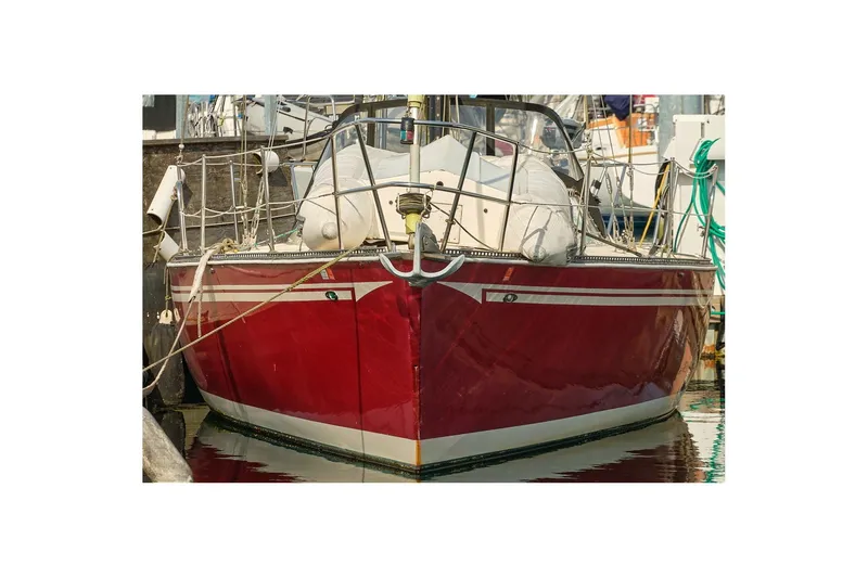 The Image of Red 1980 Sceptre 36 Brandywine boat docked at marina, front view. - 0