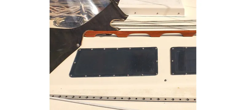 Slide: The Image of 1980 Sceptre 36 Brandywine yacht deck with windows and rigging details. - 11