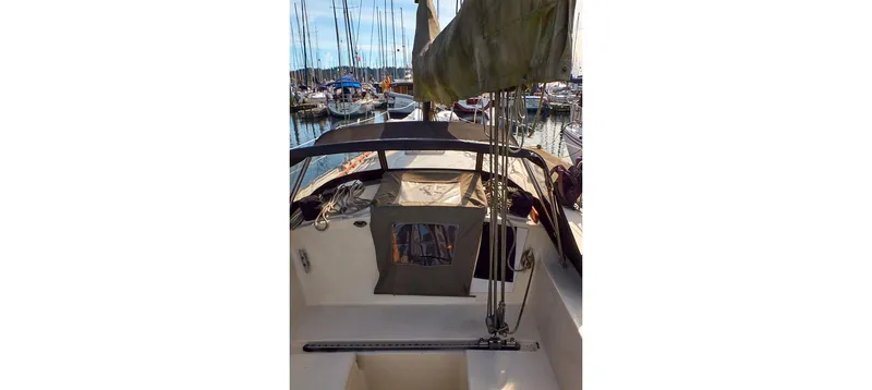 Slide: The Image of 1980 Sceptre 36 Brandywine sailboat cockpit view in marina setting. - 25
