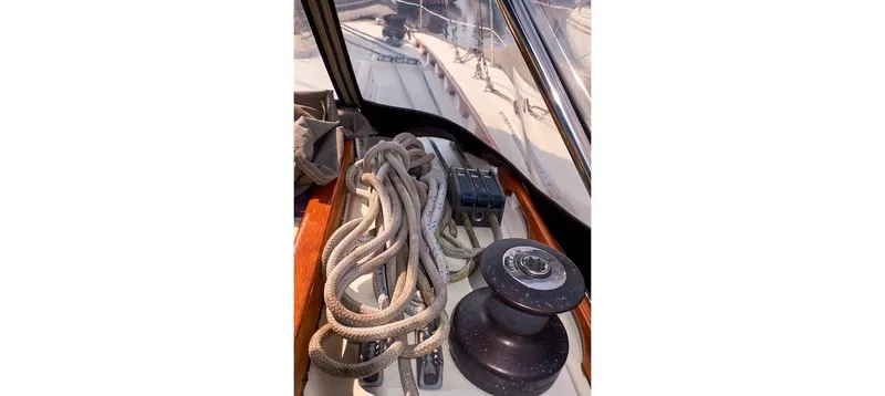 Slide: The Image of Deck view of 1980 Sceptre 36 Brandywine sailboat with coiled ropes and winch. - 30
