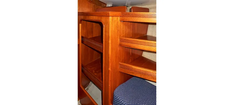 Slide: The Image of Wooden interior shelving in a 1980 Sceptre 36 Brandywine boat cabin. - 7