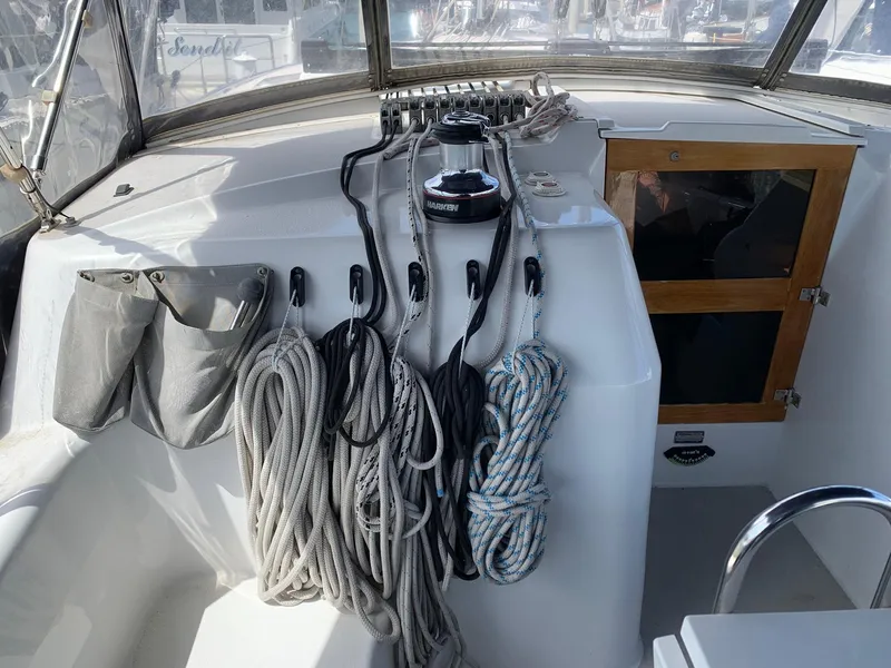 Slide: The Image of Cockpit of 2007 Catalina Morgan 440 sailboat with ropes and winch. - 14