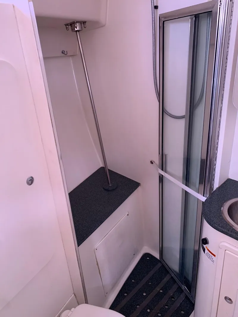 Slide: The Image of 2007 Catalina Morgan 440 yacht bathroom with shower and sink. - 27