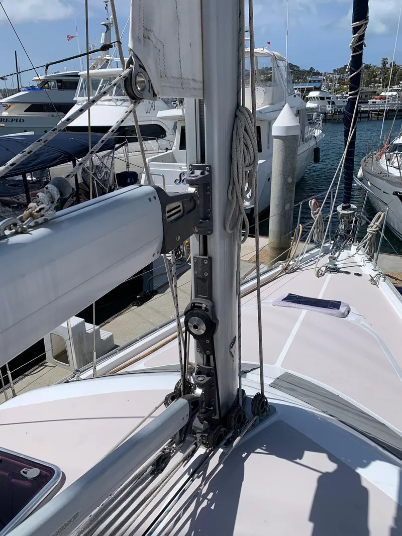 Slide: The Image of 2007 Catalina Morgan 440 sailboat docked at marina, showing mast and rigging. - 38