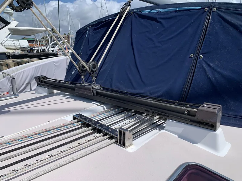 Slide: The Image of Sailboat deck of 2007 Catalina Morgan 440 with rigging and blue canvas cover. - 43