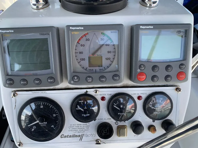 Slide: The Image of Control panel of a 2007 Catalina Morgan 440 yacht with Raymarine instruments. - 48