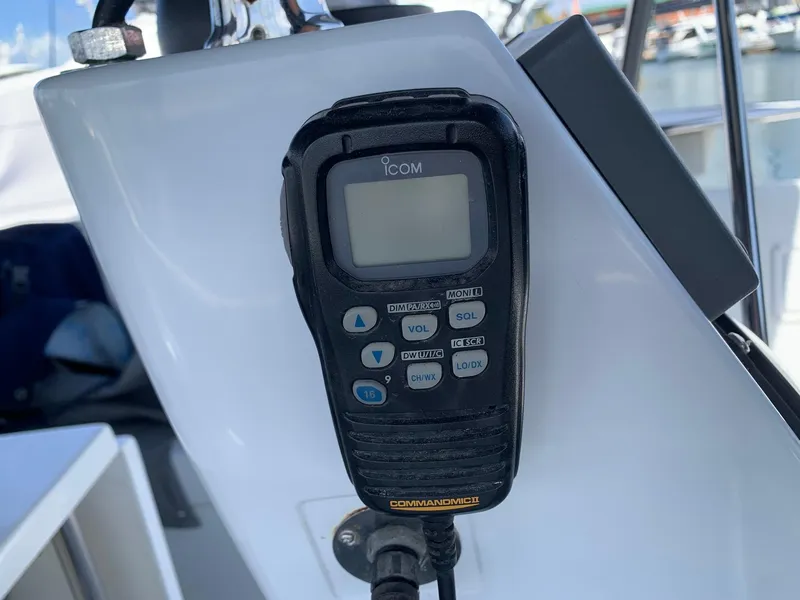 Slide: The Image of Icom marine radio on Catalina Morgan 440 yacht, 2007 model, mounted on white panel. - 49