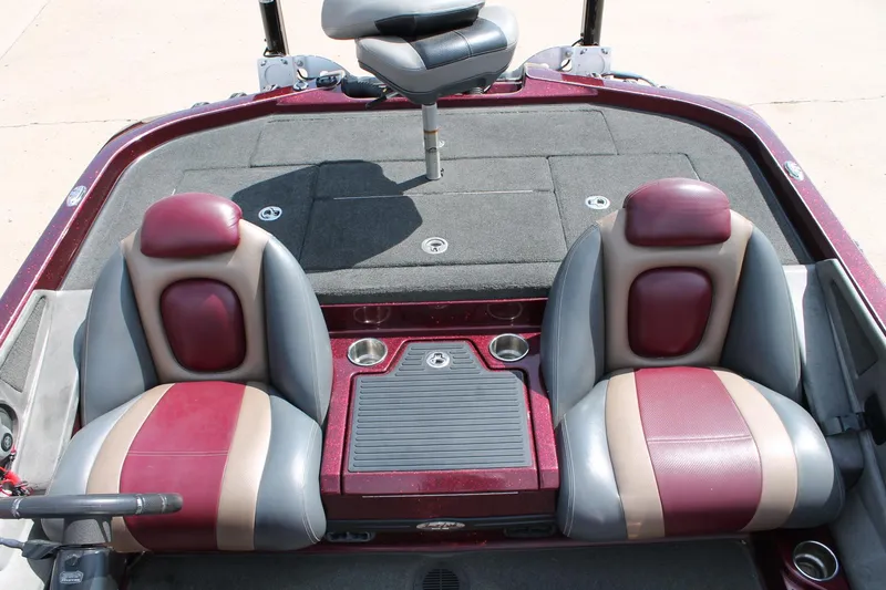 Slide: The Image of 2015 Ranger Z518C Comanche boat interior with dual seats and carpeted deck. - 10