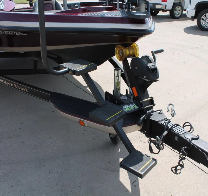 Slide: The Image of 2015 Ranger Z518C Comanche boat trailer with steps and winch system. - 11