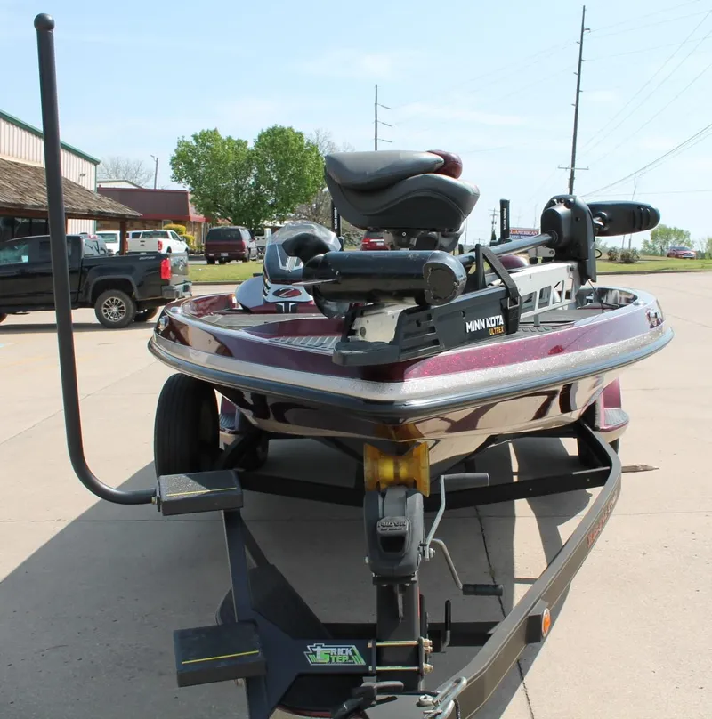 Slide: The Image of 2015 Ranger Z518C Comanche boat on trailer, parked outdoors. - 12