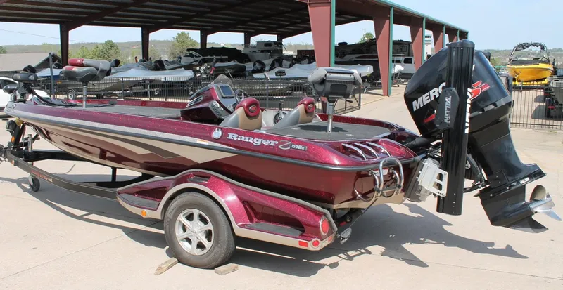 Slide: The Image of 2015 Ranger Z518C Comanche bass boat with Mercury engine on trailer. - 6