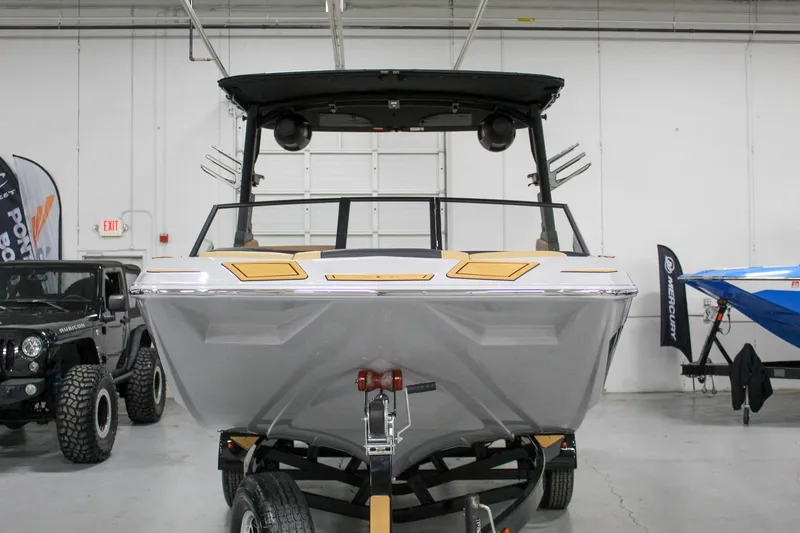 Slide: The Image of 2025 ATX Surf Boats 20 Type-S on trailer in showroom. - 3