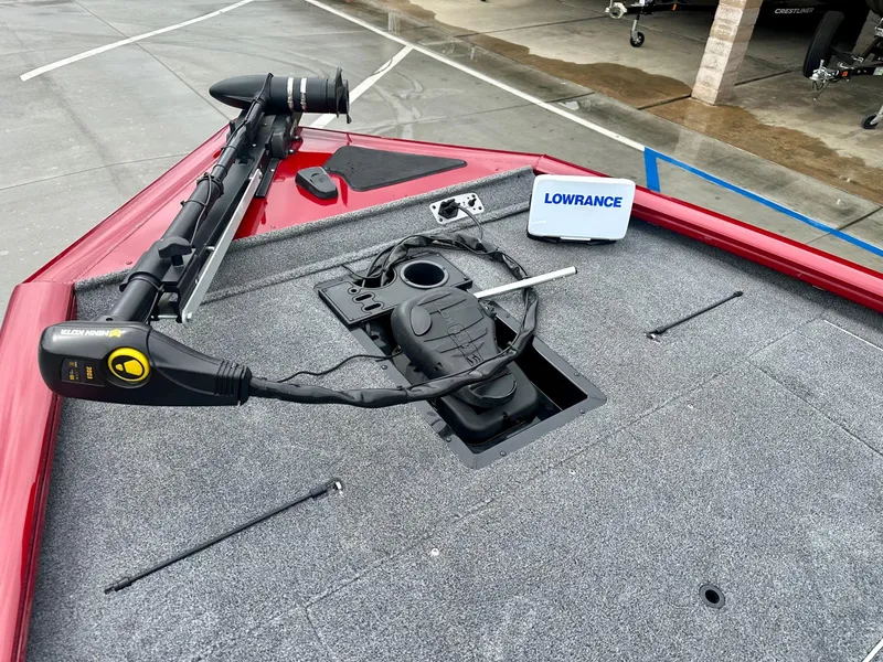 Slide: The Image of 2019 Tracker Pro Team 195 TXW boat deck with trolling motor and Lowrance fish finder. - 6