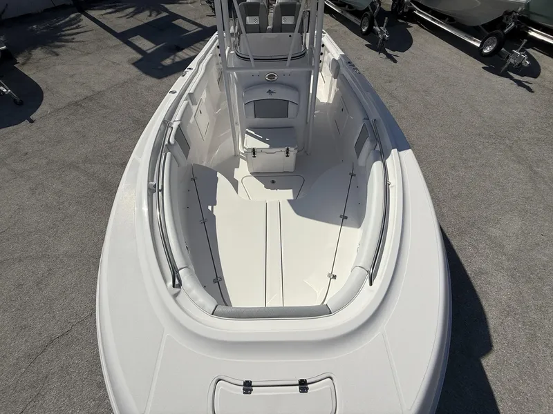 Slide: The Image of 2024 Aquasport 2500 CC boat, top view of spacious deck and seating area. - 30