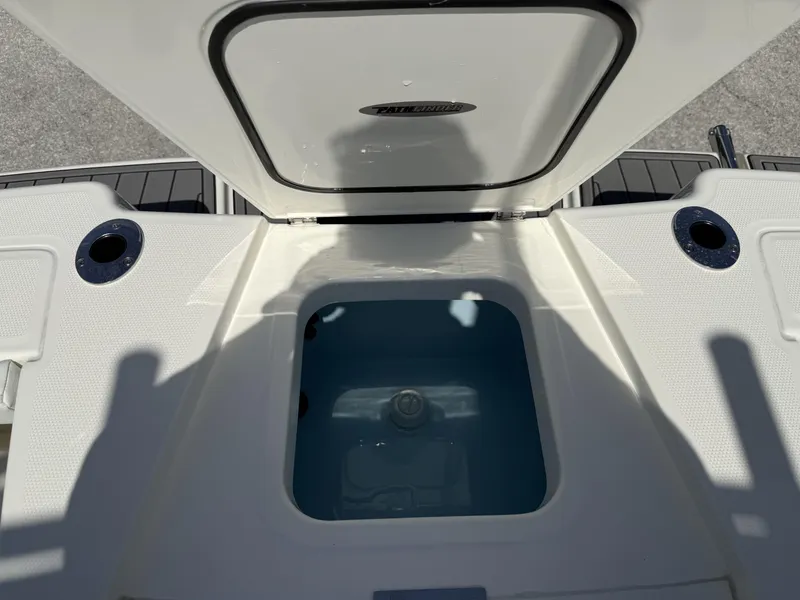 Slide: The Image of Open storage compartment on 2025 Pathfinder 2400 Open boat, featuring sleek design and functionality. - 14