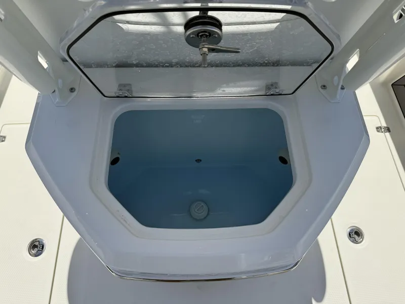 Slide: The Image of Open storage compartment on 2025 Pathfinder 2400 Open boat. - 15