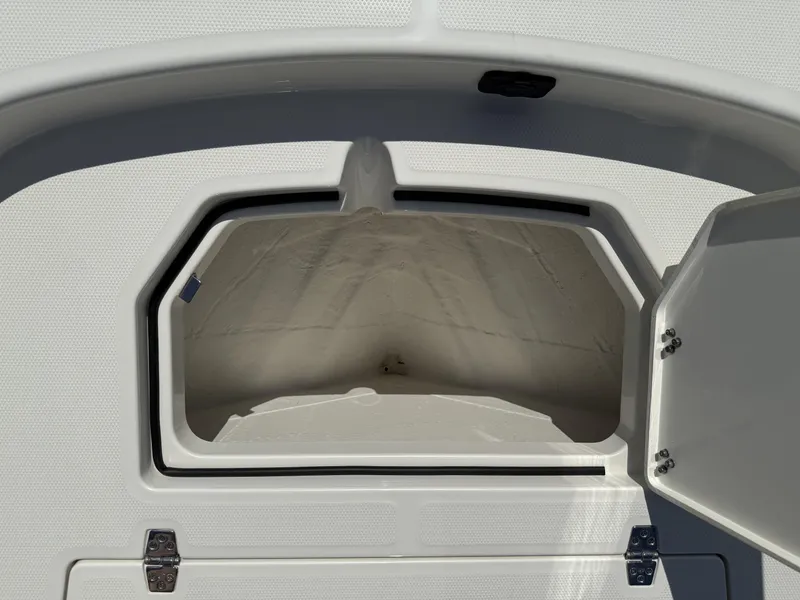 Slide: The Image of Open storage compartment on 2025 Pathfinder 2400 Open boat. - 21