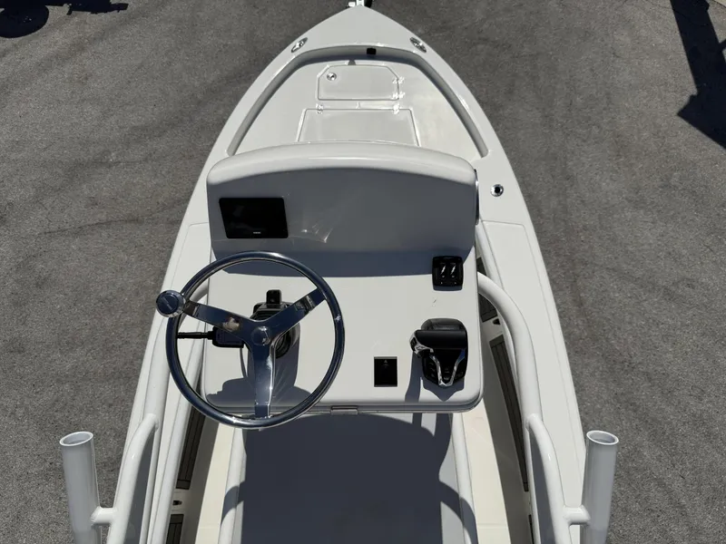 Slide: The Image of 2025 Pathfinder 2400 Open boat console with steering wheel and controls. - 22