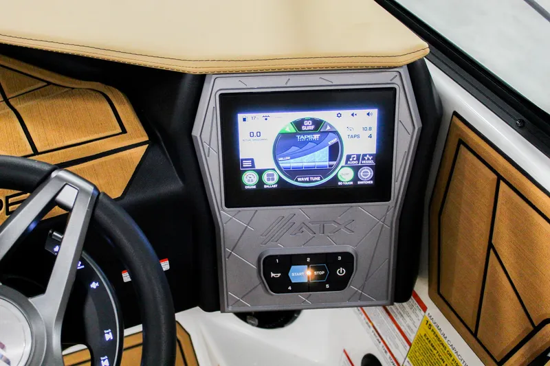 Slide: The Image of 2025 ATX Surf Boats 22 Type-S dashboard with touchscreen display and steering wheel. - 16