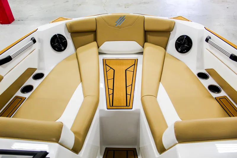Slide: The Image of 2025 ATX Surf Boats 22 Type-S interior with tan seating and modern design. - 9
