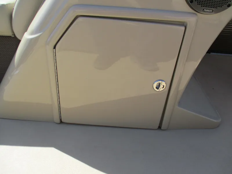 Slide: The Image of 2019 Crest FISH 200 C4 boat storage compartment with speaker detail. - 10