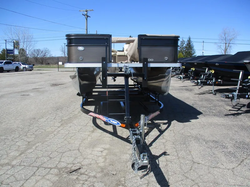 Slide: The Image of 2019 Crest FISH 200 C4 pontoon boat on trailer in parking lot. - 15
