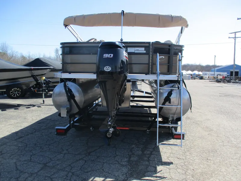 Slide: The Image of 2019 Crest FISH 200 C4 pontoon boat with Suzuki 90 engine, parked outdoors. - 16