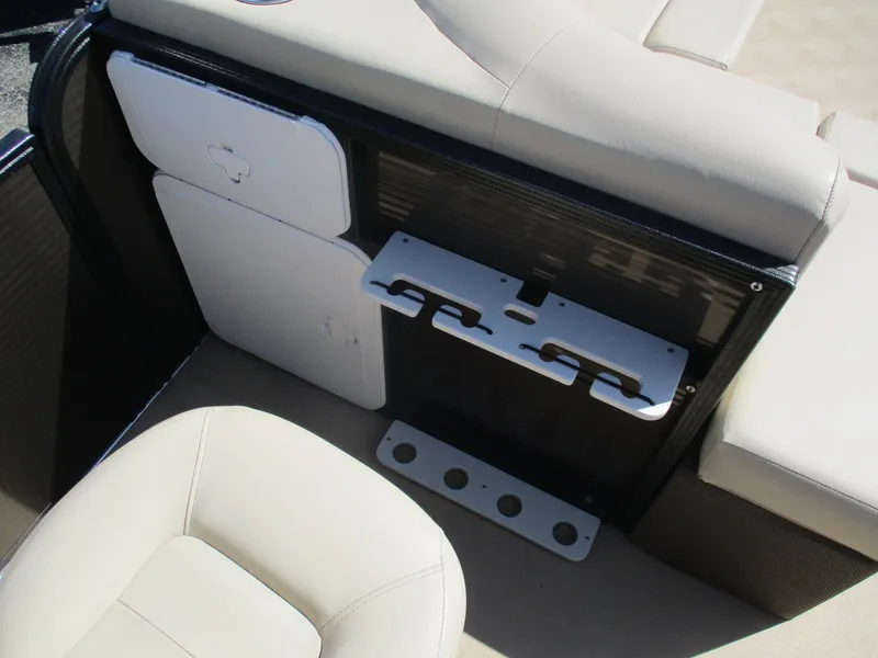 Slide: The Image of 2019 Crest FISH 200 C4 boat interior with beige seating and storage compartments. - 17