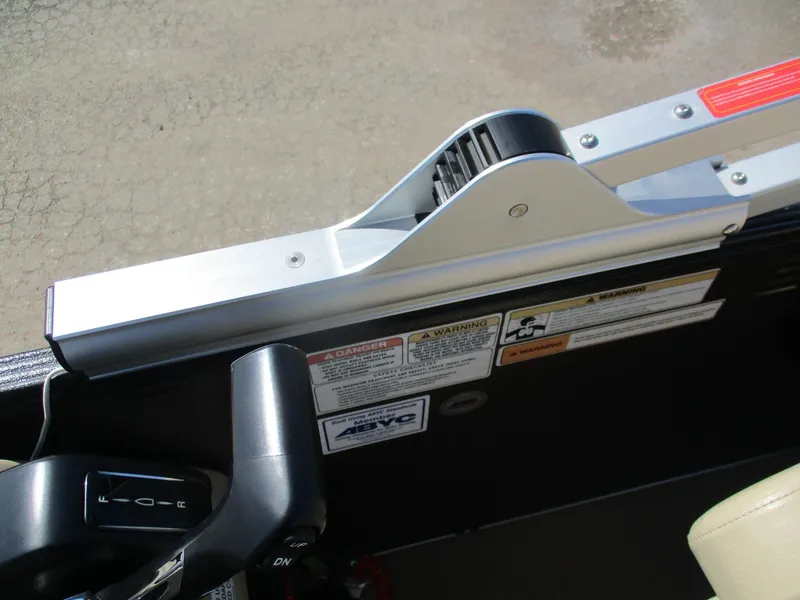 Slide: The Image of 2019 Crest FISH 200 C4 boat control panel with warning labels and throttle lever. - 22