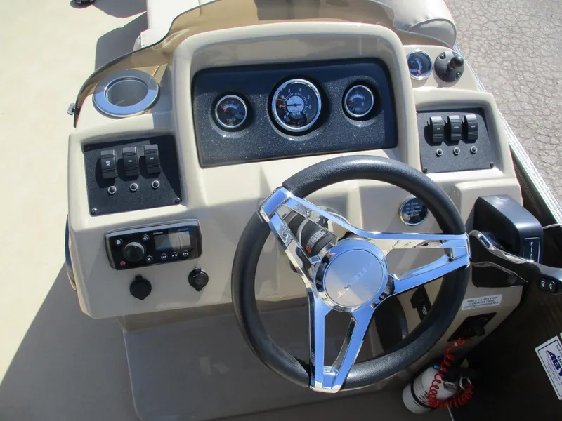 Slide: The Image of Steering console of 2019 Crest FISH 200 C4 boat with gauges and controls. - 8