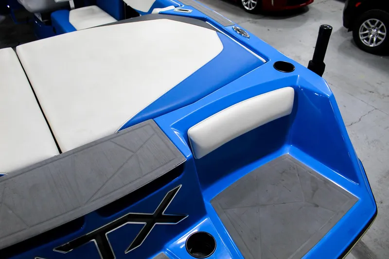 Slide: The Image of 2020 ATX Surf Boats 24 Type-S, blue interior, rear seating and deck view. - 26