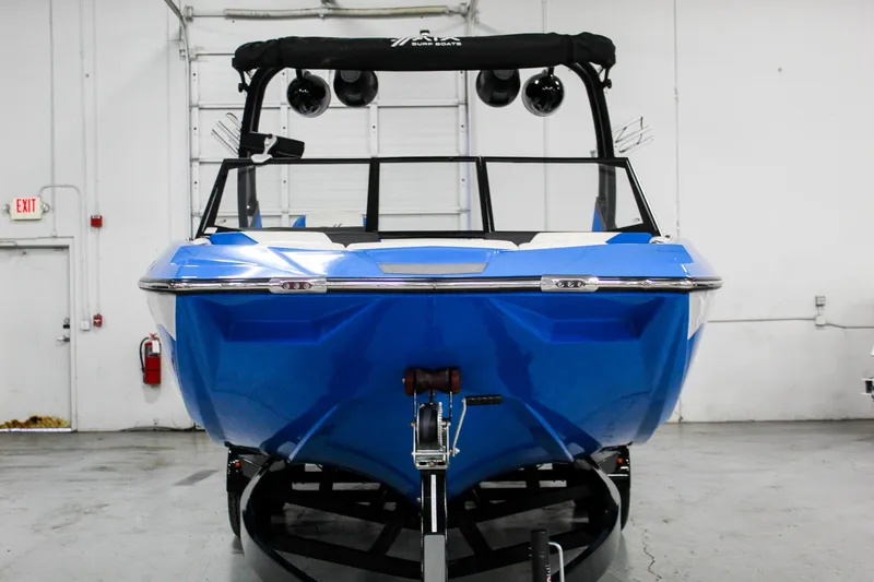 Slide: The Image of 2020 ATX Surf Boats 24 Type-S in a showroom, front view. - 3