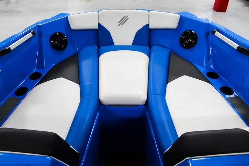 Slide: The Image of 2020 ATX Surf Boats 24 Type-S interior with blue and white seating. - 9