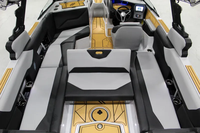 Slide: The Image of 2025 ATX Surf Boats 24 Type-S interior with modern seating and sleek design. - 22