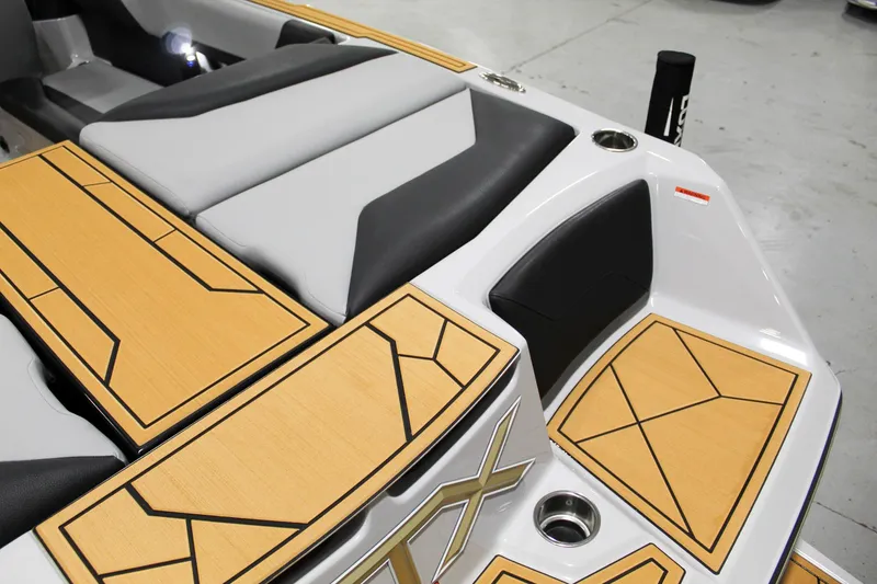 Slide: The Image of 2025 ATX Surf Boats 24 Type-S interior with stylish seating and deck design. - 24
