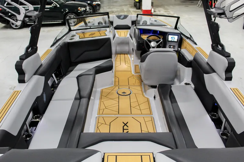 Slide: The Image of 2025 ATX Surf Boats 24 Type-S interior with modern design and spacious seating. - 25