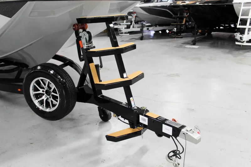 Slide: The Image of Trailer hitch and steps of 2025 ATX Surf Boats 24 Type-S in showroom. - 29