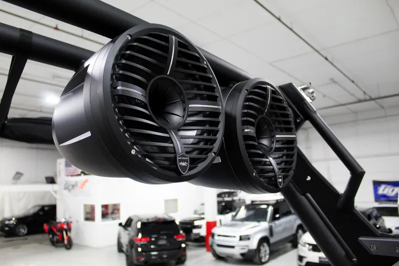 Slide: The Image of 2025 ATX Surf Boats 24 Type-S speakers in a showroom setting. - 30