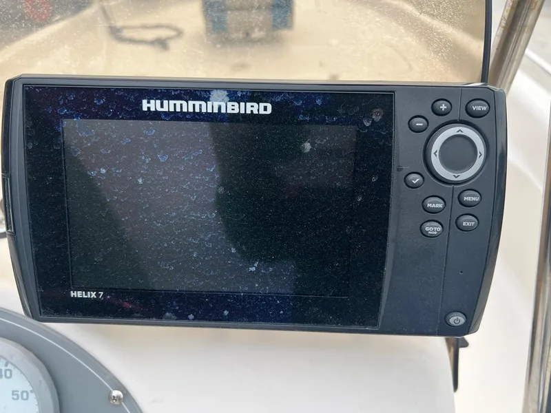 Slide: The Image of Fishmaster 1960 boat with Humminbird Helix 7 fish finder, 2002 model. - 6