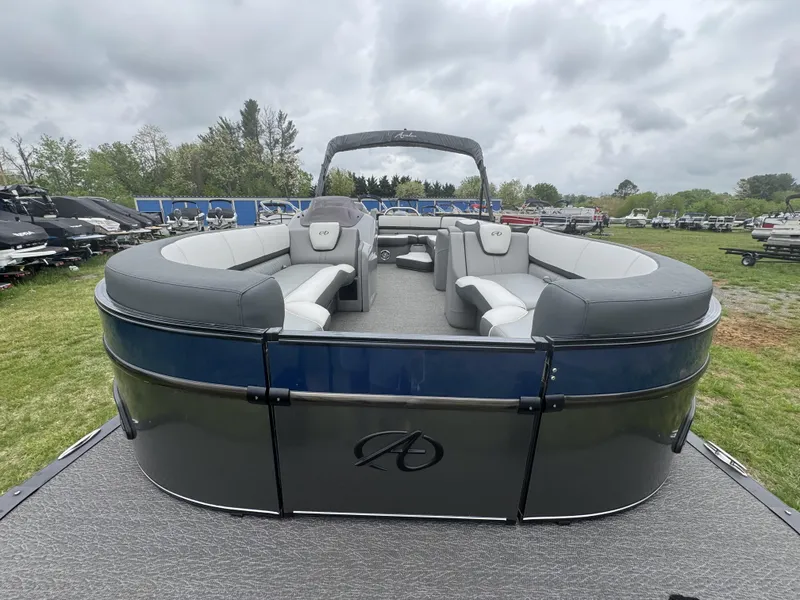Slide: The Image of 2021 Avalon Catalina Rear J Lounger 25' pontoon boat on display, featuring sleek design and spacious seating. - 17