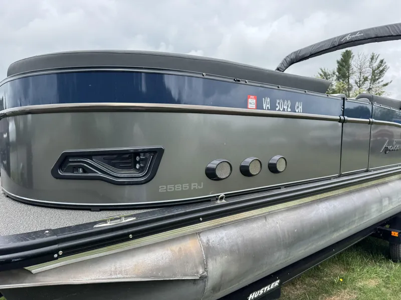 Slide: The Image of 2021 Avalon Catalina Rear J Lounger 25' pontoon boat, side view, on trailer. - 33