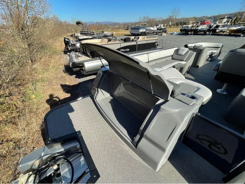 Slide: The Image of 2021 Avalon Catalina Rear J Lounger 25' pontoon boat in outdoor storage area. - 6