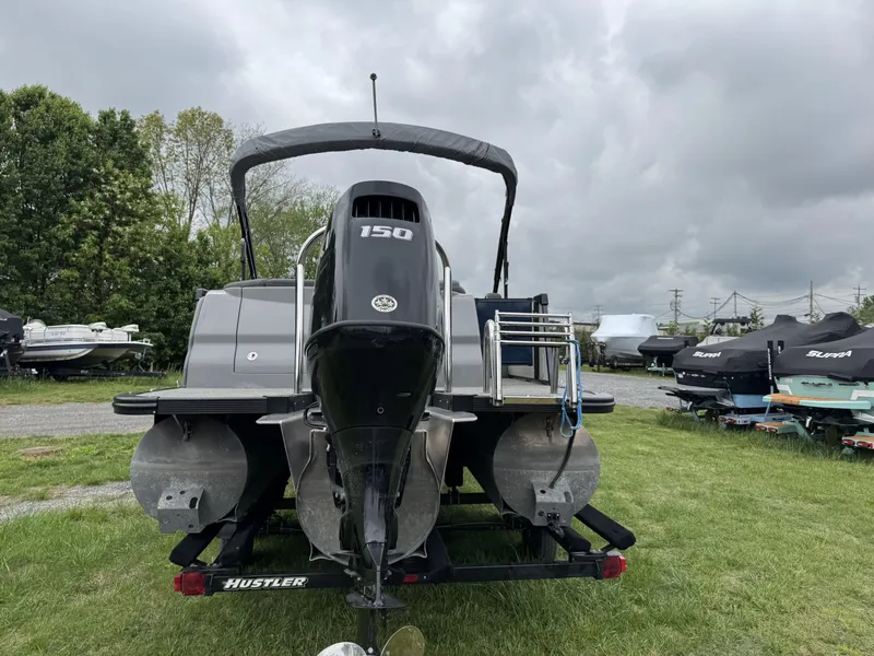 Slide: The Image of 2021 Avalon Catalina Rear J Lounger 25' pontoon boat with 150 HP engine on trailer. - 9